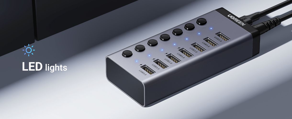 Šakotuvas USB 7 prievadų (USB-A 3.0, 4x krovimui) su maitinimo adapteriu DC 12V/2A, pilkas UGREEN/90307 6957303893072