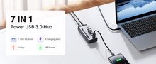 Šakotuvas USB 7 prievadų (USB-A 3.0, 4x krovimui) su maitinimo adapteriu DC 12V/2A, pilkas UGREEN/90307 6957303893072