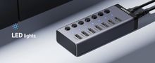 Šakotuvas USB 7 prievadų (USB-A 3.0, 4x krovimui) su maitinimo adapteriu DC 12V/2A, pilkas UGREEN/90307 6957303893072